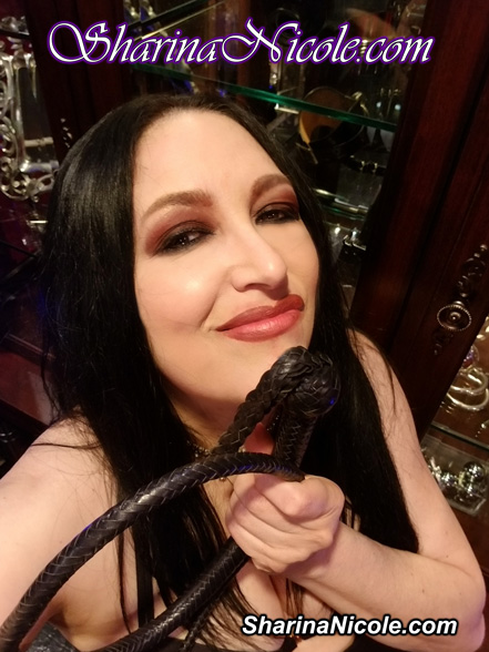 Femdom Dominatrix Mistress Sharina Nicole with whip in her studio Minneapolis, Minnesota June 2020